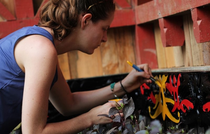 Liza Heavener painting the upgraded admin desk @ (SOC) Sintang Orangutan Centre